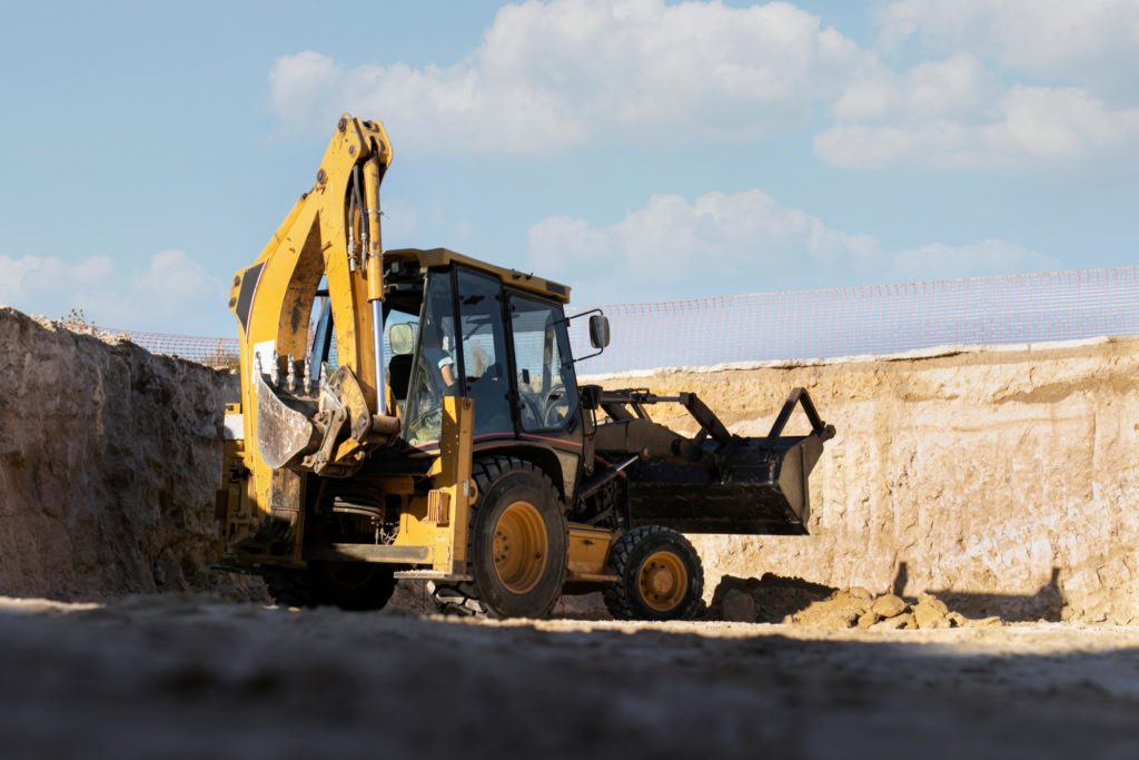Backhoe loader on civil construction site